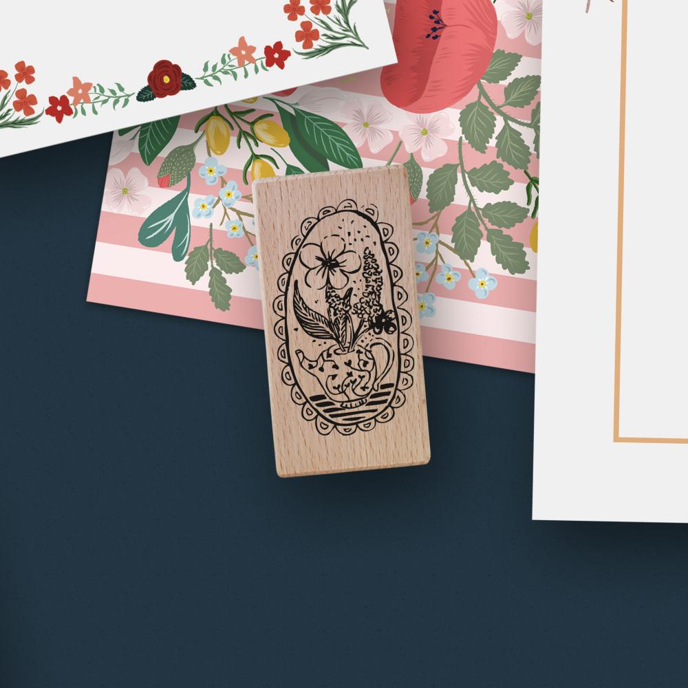 stempel teekanne mit blumen und rahmen